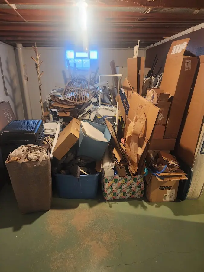 Roll-off dumpster container at job site for 20 Yard Dumpster Rental in Laketown